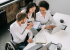man in wheelchair discussing something in a professional setting, such as a bank